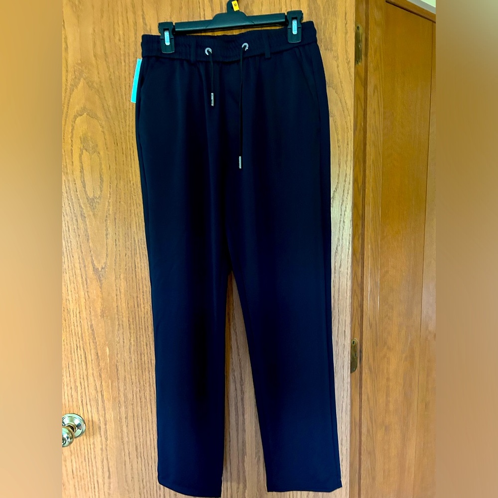 Men’s athletic pants by Stridecool.  NWT.  Very dark navy blue.